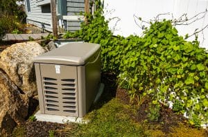 A professionally installed whole-home generator sitting outside of a St. Louis home.