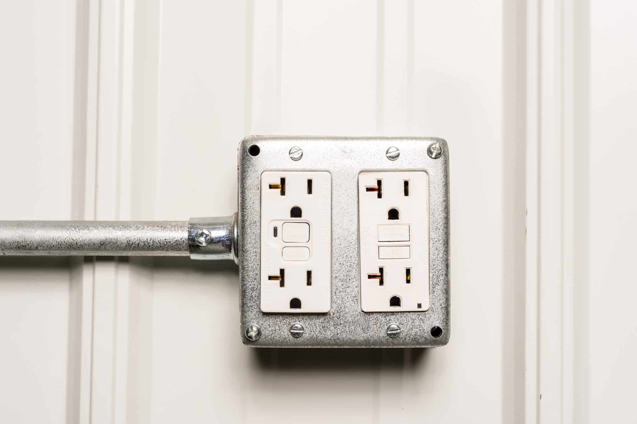A weatherproof GFCI outlet on a backyard patio in St. Charles, Missouri.